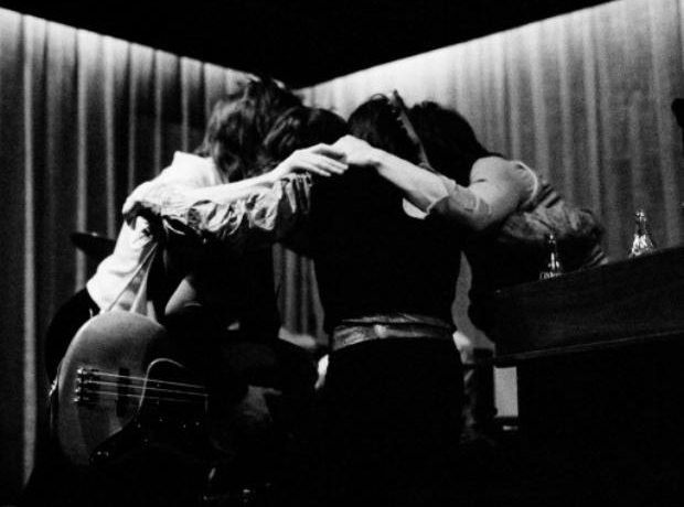 The Faces preparing to perform on stage