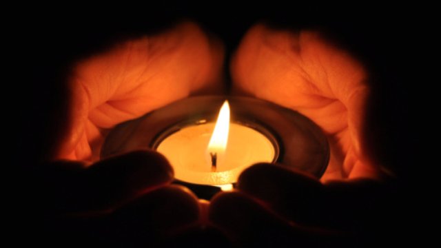 Holding Candle