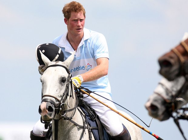 Prince Harry playing polo
