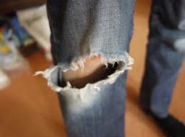 A lady's ripped jeans
