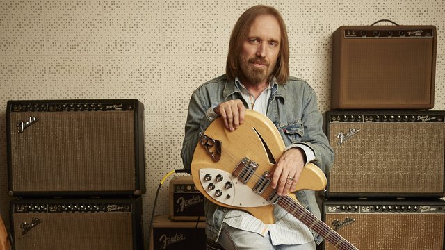 Tom Petty with guitar