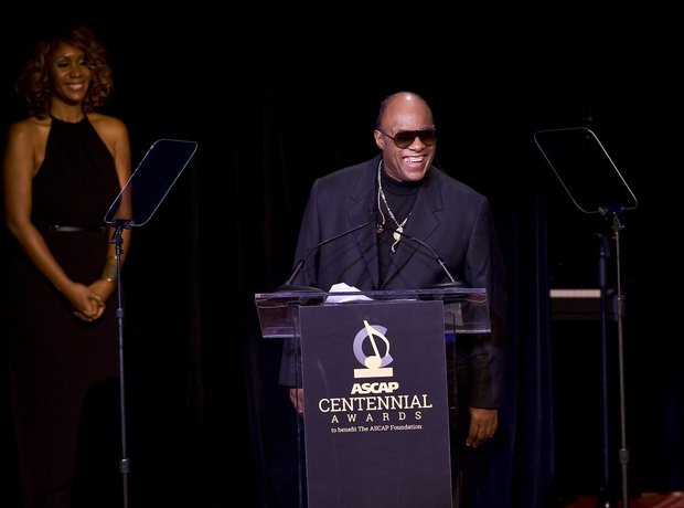 Stevie Wonder watched by partner Tomeeka Roby