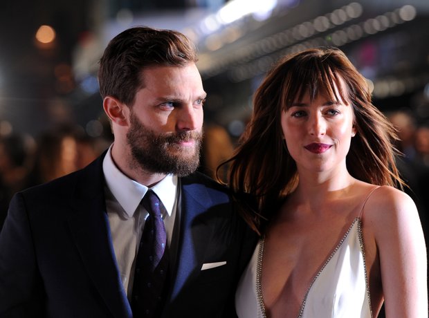 Jamie Dornan and Dakota Johnson on the grey carpet