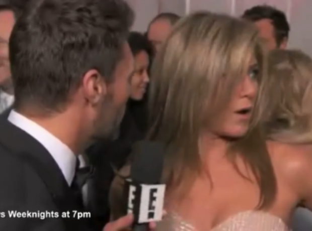 Jennifer Aniston gets pinched by Reese Witherspoon