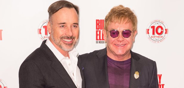 Sir Elton John and husband David Furnish attend th