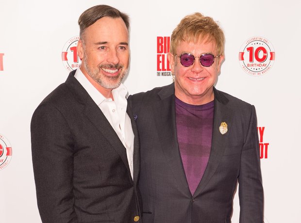 Sir Elton John and husband David Furnish attend th