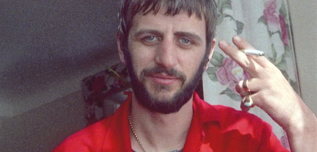 Ringo Starr with copy of Photograph by Ringo Starr