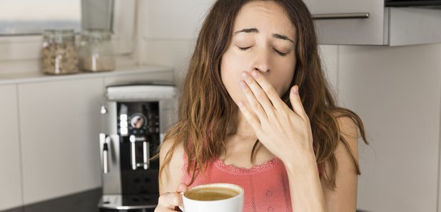 Sleepy woman in the morning drinking coffee