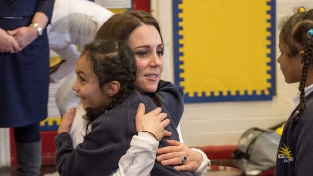Kate Middleton visiting a school