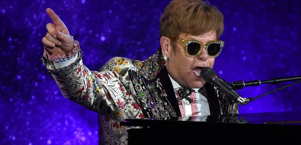 Elton John performing