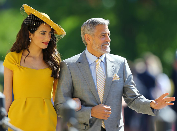 Amal Clooney and George Clooney arrive at St Georg
