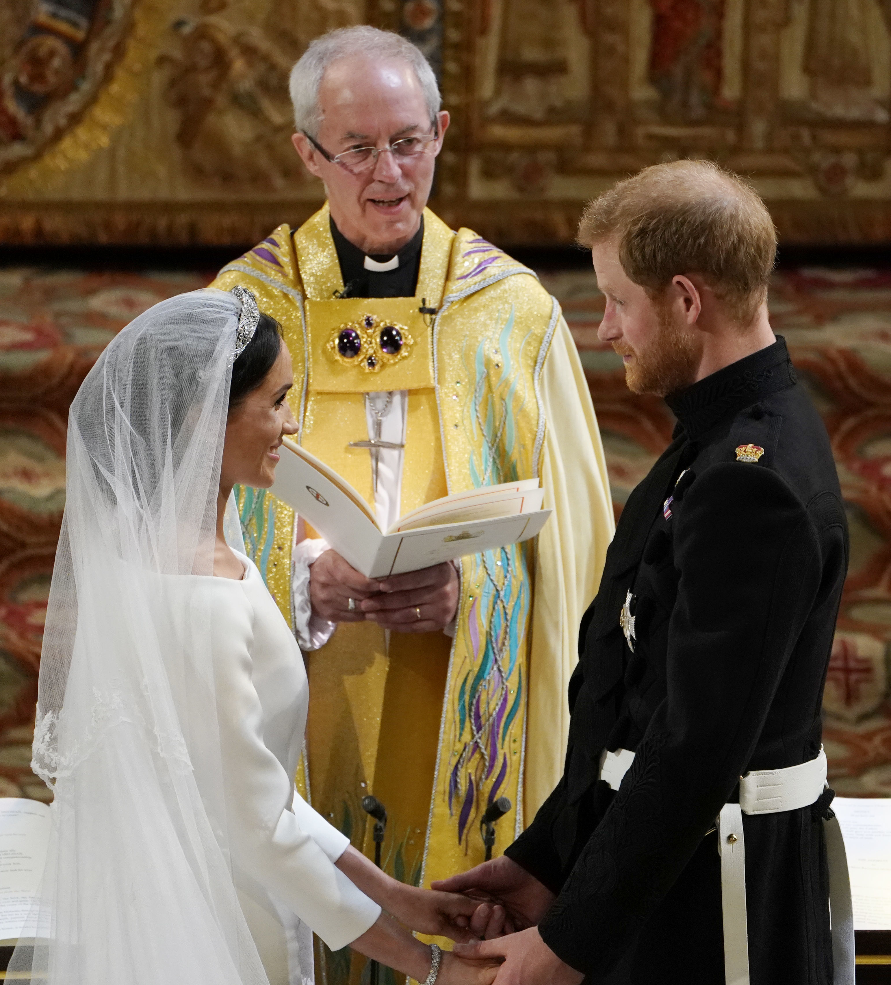 Prince Harry and Meghan Markle exchange vows