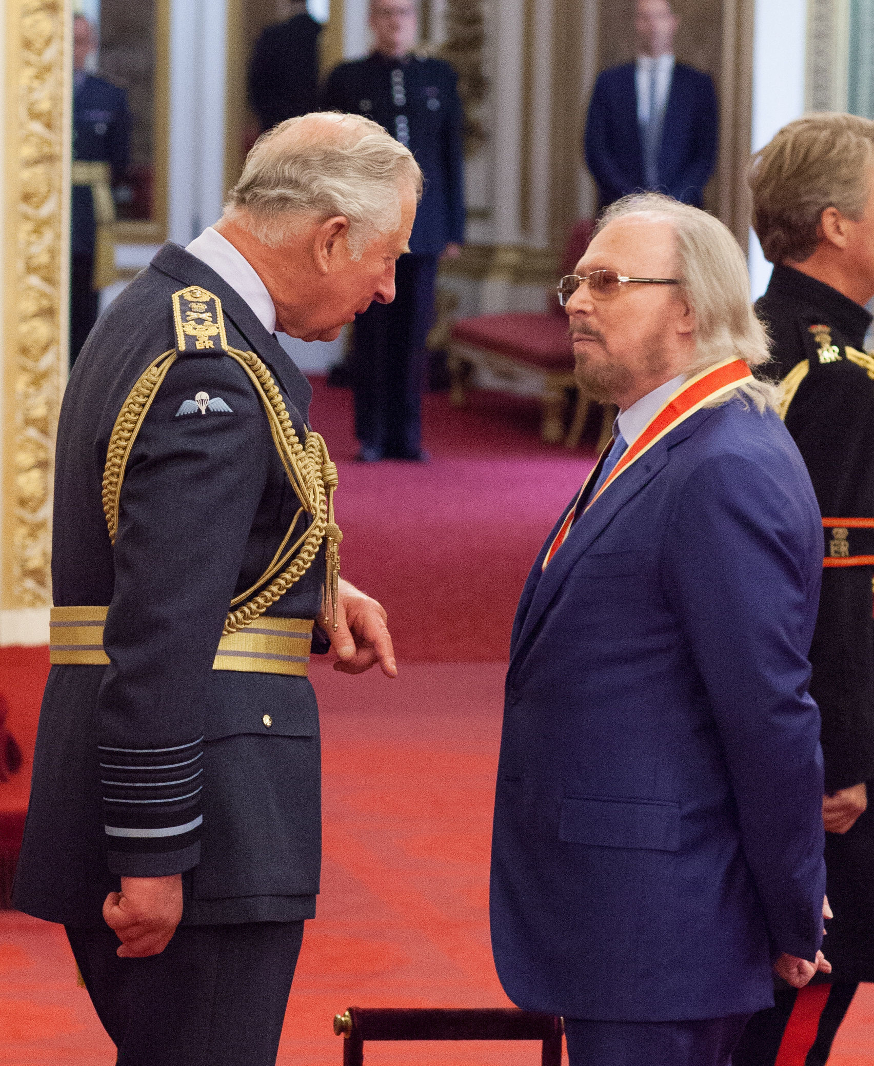 Barry Gibb receives his knighthood from Prince Cha